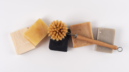 Set of different handcraft organic soap bars and cleaning brush