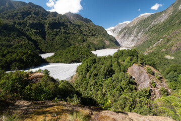Elevated view from Sentinel Rock looking up the Waiho River valley to the Franz Josef glacier in the Southern Alps, West Coast, South Island, New Zealand.