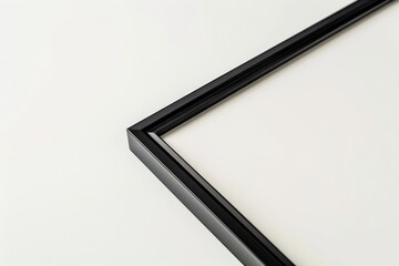An artistic close-up of a black frame corner on a white background, emphasizing the clean geometric lines and harmonious contrast, perfect for modern interior decor.