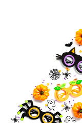 Halloween decorations on white background. Top view pumpkins, spiders, webs, spooky glasses.
