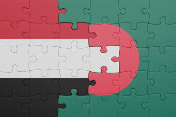 puzzle with the colourful national flag of yemen and flag of bangladesh .