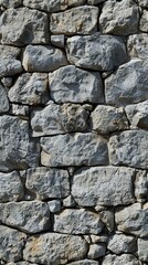 Obraz premium Rough Stone Wall Texture: A Rugged Concept