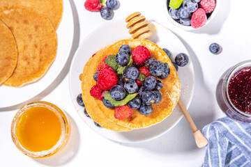 Stack of pancakes with berries