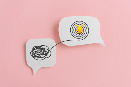 Mental health, brain disorder, World mental health day, Alzheimer, Psychology concept. Tangle of thoughts and clear line on real   white speech bubble paper cut with pink background