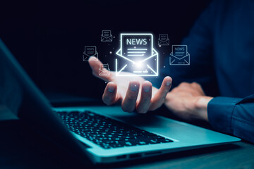 Businessmen use laptops with communication icons, letter icons, email icons, and newsletter email...