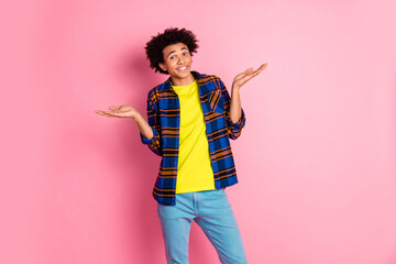 Photo of funny nice man wear checkered clothes no answer gesture isolated on pink color background