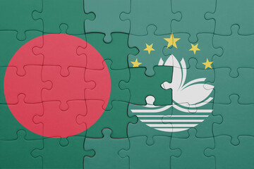 puzzle with the colourful national flag of bangladesh and flag of Macau .