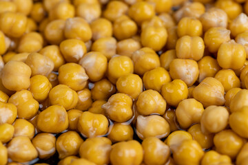 chickpeas porridge with honey during cooking
