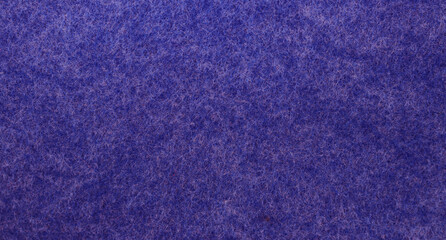 Surface of felted fabric texture abstract background in navy blue color. Concept for copy space.