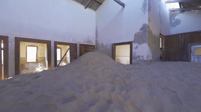 Kolmanskop, The abandoned houses. the famous tourist attraction in Namibia, South Africa. Empty sand dune in home room . The ghost town.