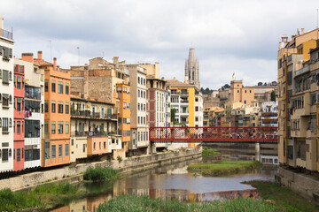 Fototapeta premium View of the old town, river and basilica on a summer day. Gerona. Spain.