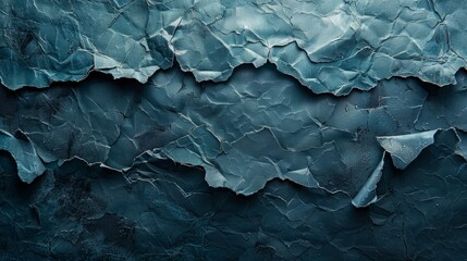 Fototapeta premium A striking closeup macro photograph capturing torn paper with a beautiful teal blue hue