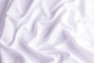 Naklejka premium Chic white wedding background in white satin with soft pleats. delicate folds of fabric. A copy of the space. design. layout. template.