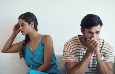 Couple, frustrated and fight in living room for argument, marriage conflict and relationship drama...