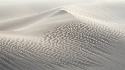 Obraz premium Photograph of wind-swept sand dunes, capturing the subtle ripples and grains in the close-up view