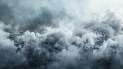 Obraz premium Swirling gray smoke creates dense fog against a dark background, adding mystery and drama. Perfect for spooky or halloween vibes