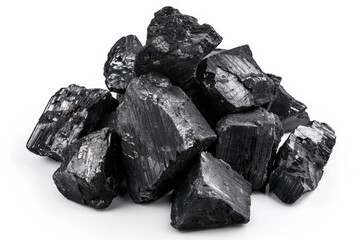 A pile of coal sits on a clean and pure white surface, making for an interesting contrast
