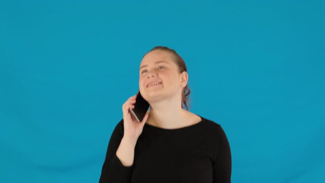 Woman discusses positive outcomes and promising prospects on phone. Lady enthusiasm evident in every word speaking during phone call