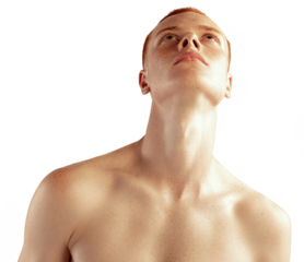 Portrait of young red-haired man posing shirtless, looking upwards against transparent background. Concept of men's health, lifestyle, beauty, body and skin care. Model with freckles