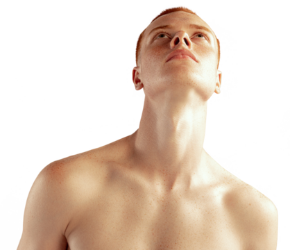 Portrait of young red-haired man posing shirtless, looking upwards against transparent background. Concept of men's health, lifestyle, beauty, body and skin care. Model with freckles