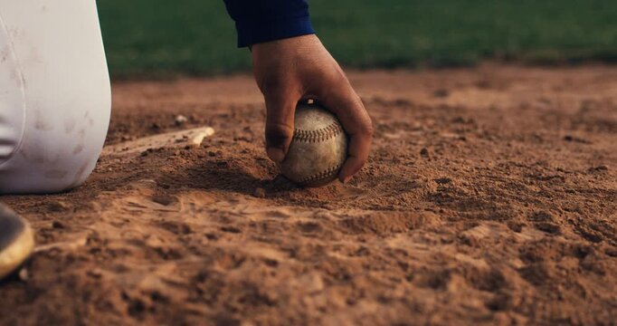 Super slow motion close up of baseball player taking from ground  baseball ball during competition game match on baseball stadium at 1000 fps.