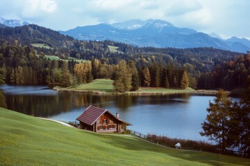 Fototapeta premium Old church in a field under a cloudy sky - film photo. Beautiful simple AI generated image in 4K, unique.