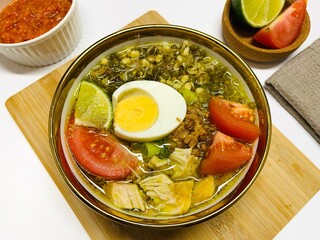 Chicken Soto or Soto Ayam in Indonesia. Soto ayam is a traditional Indonesian dish which uses ingredients such as chicken, vermicelli, bean sprout with turmeric as main ingredient add in the broth.