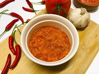 Sambal Tomat. Indonesian traditional sauce uses ingredients such as red chili, garlic and tomato paste popular in Java and Bali.