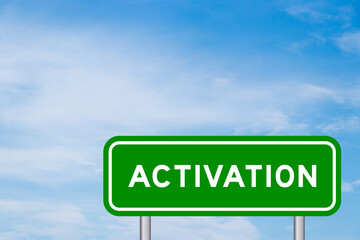 Green color transportation sign with word activation on blue sky with white cloud background