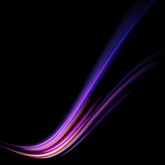 Neon color glowing lines background, high-speed light trails effect. Modern abstract high-speed light motion effect on black background. Light motion effect, slow shutter of traffic.