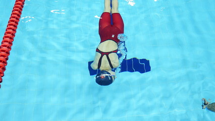 Paralympic swimmer prepares for Paris 2024 Paralympic Games. Amputee Athletes.