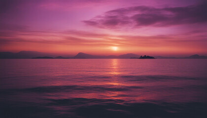 Obraz premium A breathtaking sunset over the sea, with the sky painted in hues of orange, pink, and purple 