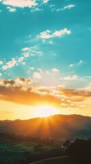 Fototapeta premium Sunrise over distant hills with a bright yellow sky