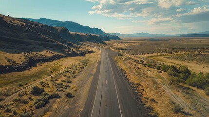 Naklejka premium aerial photography road , empty road aerial view , highway aerial view , breathtaking aerial view of an empty highway 