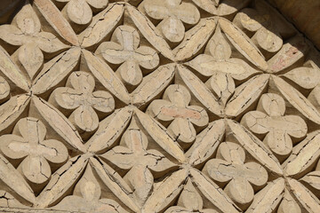 Intricate Floral Stone Carving Architectural Detail for Design, Poster, or Art Reference