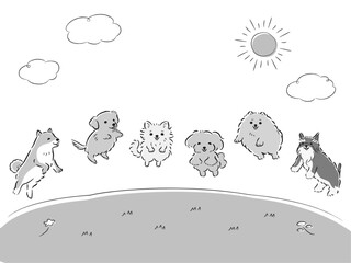 草原でジャンプする犬たちのイラストセット