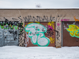 Storage units spray painted, close up, winter time