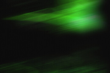 Vintage green abstract light leak overlay background with a dusty texture. Grunge style dusty overlay light leak background. Green light overlay, leak flare, prism light effect.