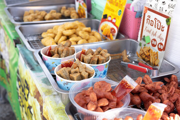 Thai style grilled food. Street foods in Thailand. Local food market.