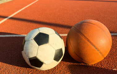 Set of sport equipment, rackets and tennis balls soccer and basketball balls