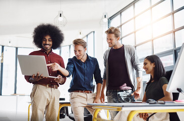 Teamwork, happy and laptop in office for brainstorming, planning and development for start up. Online, group and technology for web design and creativity or diversity in agency or company for project