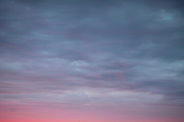 Sunrise sky above a city. Incredible natural colors. Red, orange, purple, dark blue. Heaven.