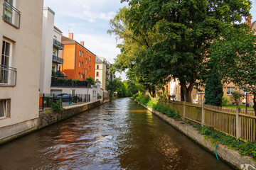 Residential buildings to the left and right of the Senkelbach in Augsburg Oberhausen