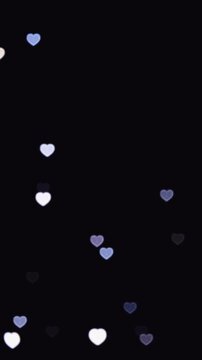 Soft light heart blinking overlay vertical video effect black background screen overlay video effect 4K KTV VFX visual abstract 16mm and 35mm lens glow lights hearts pattern disco overlay video 