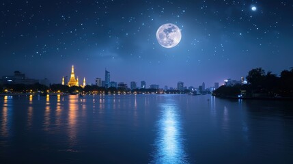 A serene night scene featuring a glowing moon over a shimmering river, with city lights reflecting in the water under starry skies. Bangkok Thailand.