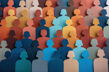 Obraz premium Colorful cutout silhouette crowd artwork highlighting diversity, unity, and population. Vibrant paper cutouts creating a diverse group concept.