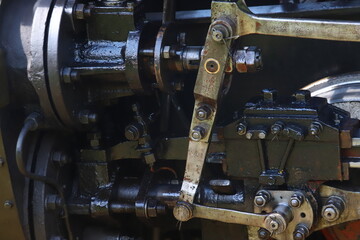 oiled machinery of the steam locomotive of the Bieszczady Forest Railway