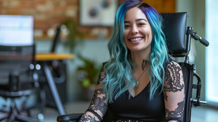 Cheerful woman in wheelchair working on computer
