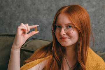 Obraz premium woman arranging her daily supplements, Wellness at Home, How Supplements Can Enhance Your Health