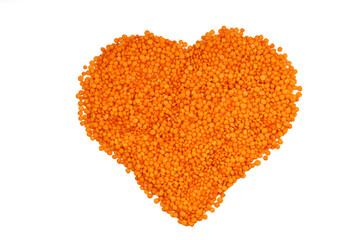 Pile red lentil in shape of heart isolated on white background. Top view. Flat lay. Vegetarian and vegan diet. High content of B vitamins in Red lentils. healthy Superfood